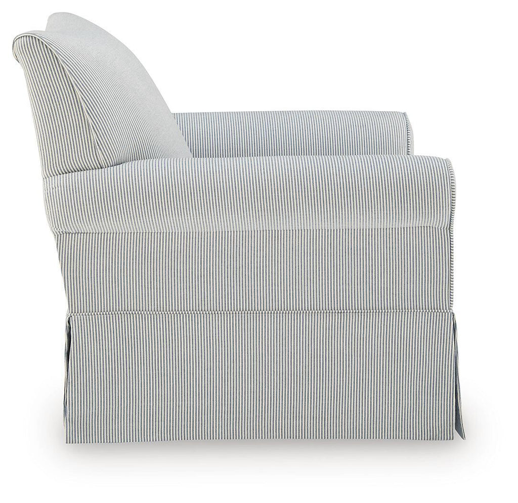 Light blue and white striped upholstered swivel glider accent chair, side view with tall back.