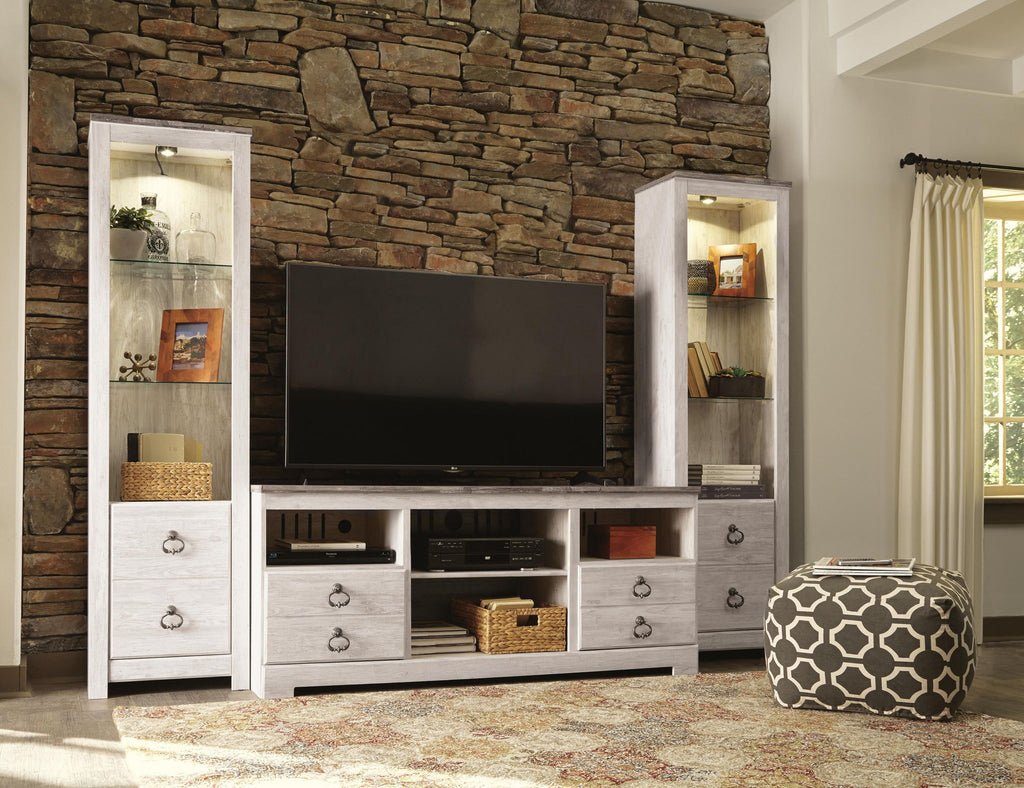 Beige entertainment center with TV stand, open shelves, and glass display cabinets with drawers