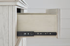 Antique white dresser open drawer showing black hardware track and metal brackets