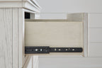 Antique white dresser drawer interior with metal support rail