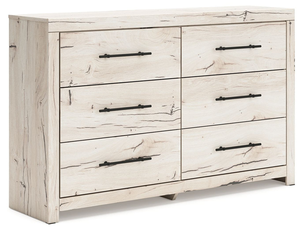 Light natural six-drawer dresser with six drawers and black bar pulls, side view.