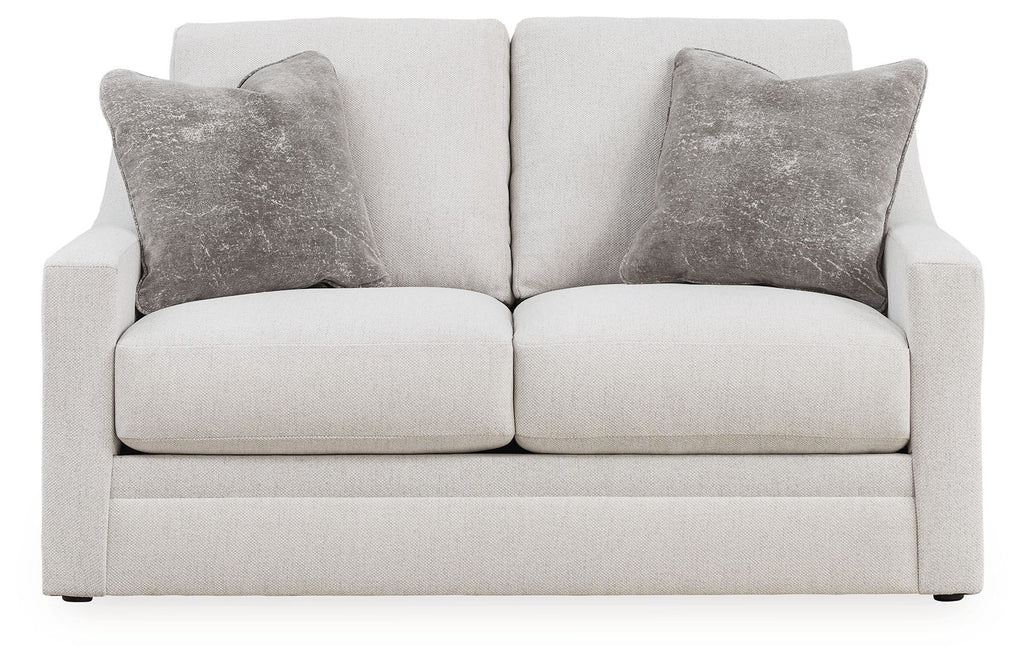 Chalk loveseat front view with two dark gray pillows on a padded back