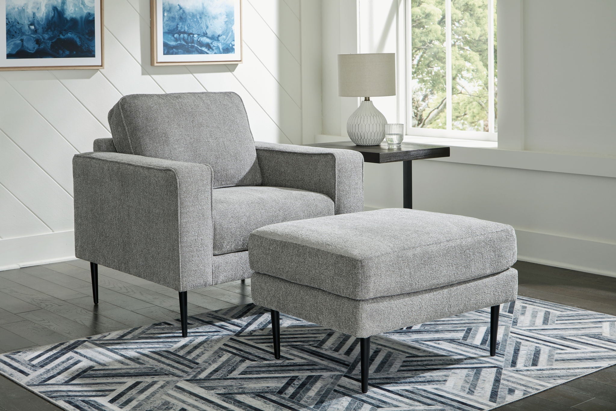 Charcoal fabric upholstered chair with matching ottoman, square arms, tapered legs