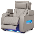 Gray power recliner with side control panel and built-in footrest, showing blue glow light