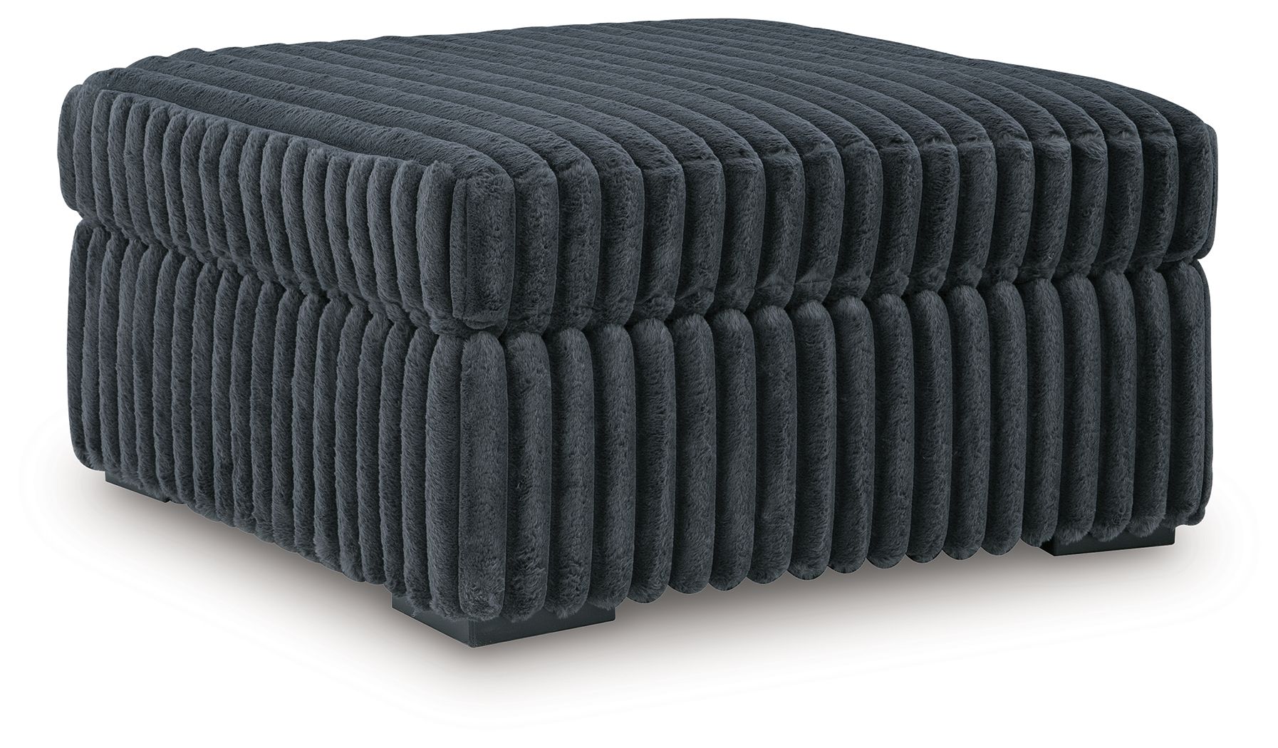 Oversized accent ottoman in blue-gray, ribbed upholstery, rounded tufted top