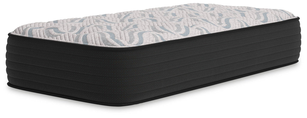 Gray plush mattress with quilted top and thick dark base, rectangular profile