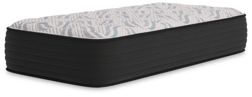 Gray plush mattress with quilted top and thick dark base, rectangular profile