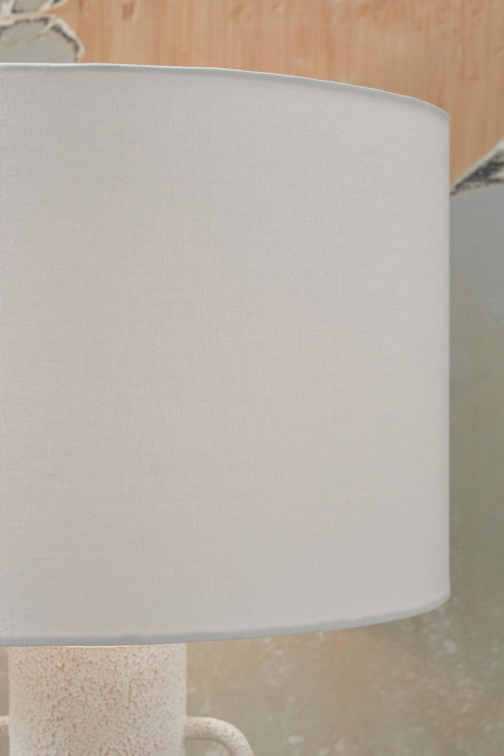Distressed white metal table lamp shade with textured pedestal base detail