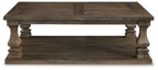 Gray rectangular cocktail table top with two turned end legs