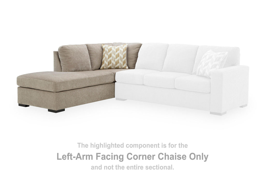 Stone gray left-arm corner chaise joined to white L-shaped sectional, throw pillow included