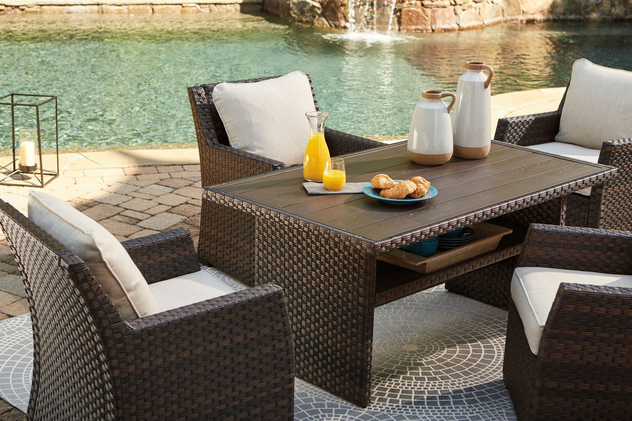 Dark brown woven multi-use table with storage shelf and top surface