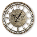 Champagne wall clock with ornate gear dial and Roman numerals