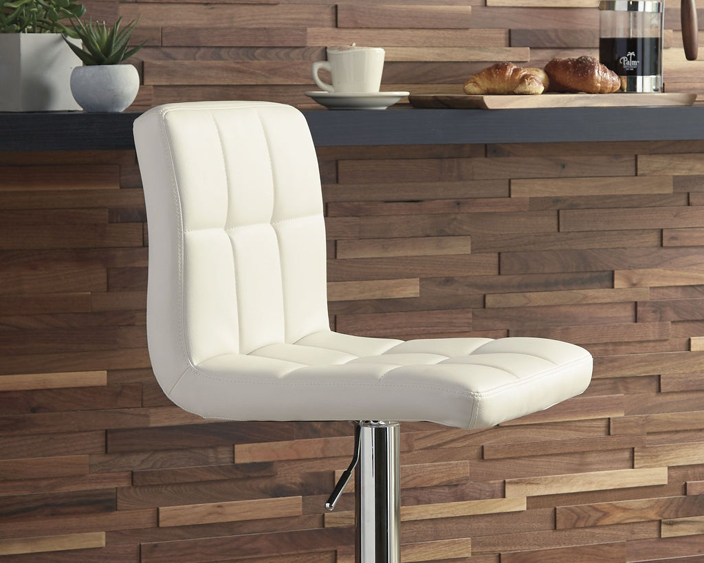 Beige adjustable barstool with padded seat and tall back, chrome base and footrest