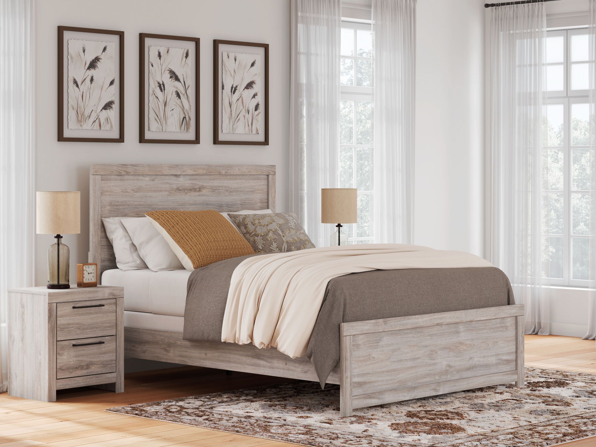 Panel bed with light brown wood-look frame and headboard, white bedding and tan throw pillow.