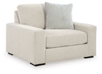 Upholstered chair and a half with tall back, wide arms, light beige linen fabric