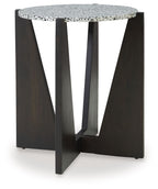 Round accent table with speckled white top and dark wood-look frame legs