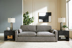 Gray fabric sofa with tufted seat cushions and matching loveseat cushions set