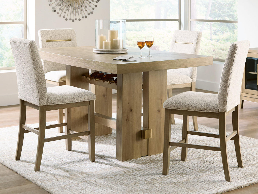 Counter-height dining table with four beige upholstered barstools in light brown wood