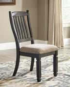 Slatback dining side chair with beige seat cushion and dark wood frame, 3/4 view