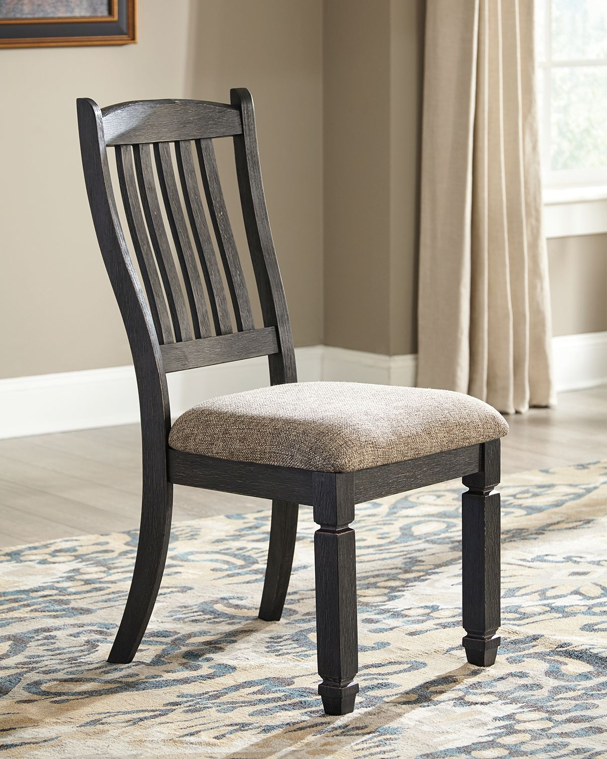 Slatback dining side chair with beige seat cushion and dark wood frame, 3/4 view