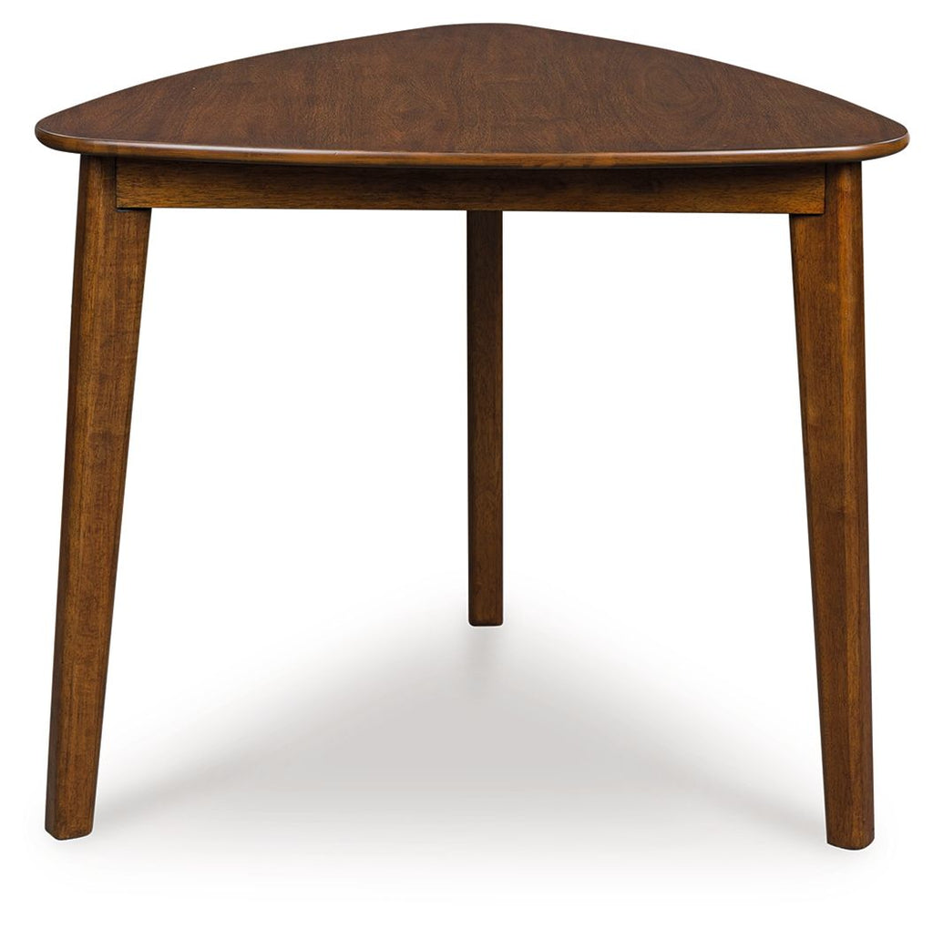 Brown triangle dining table with smooth round top and slender straight legs