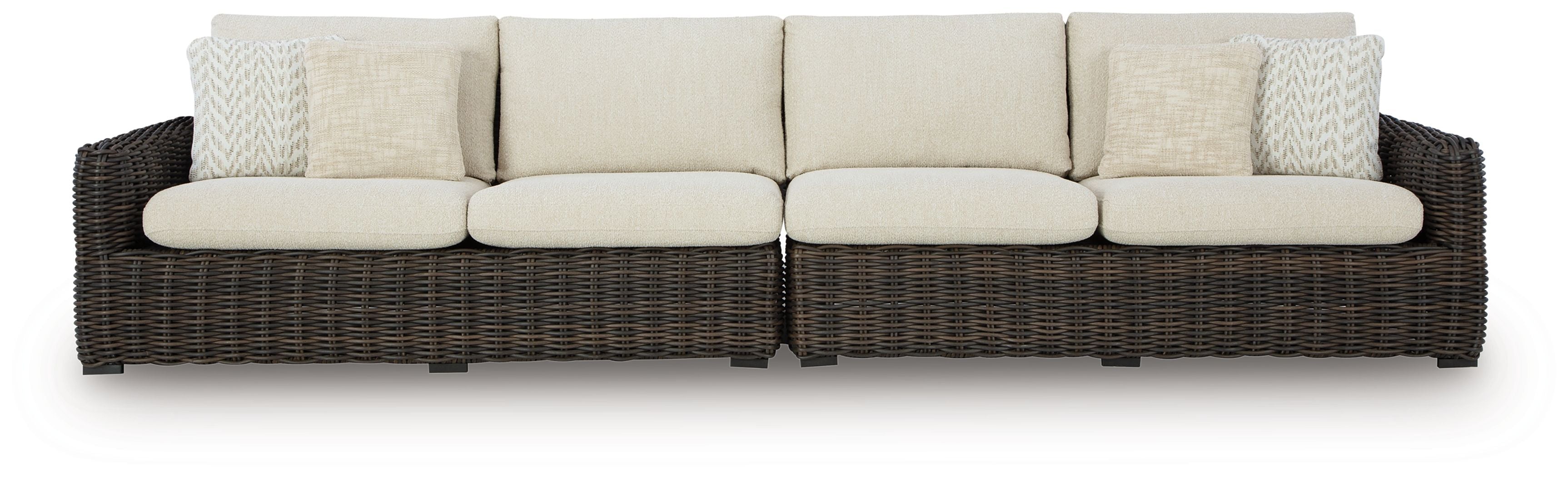 Dark brown wicker loveseat with beige seat, back, and patterned accent cushions