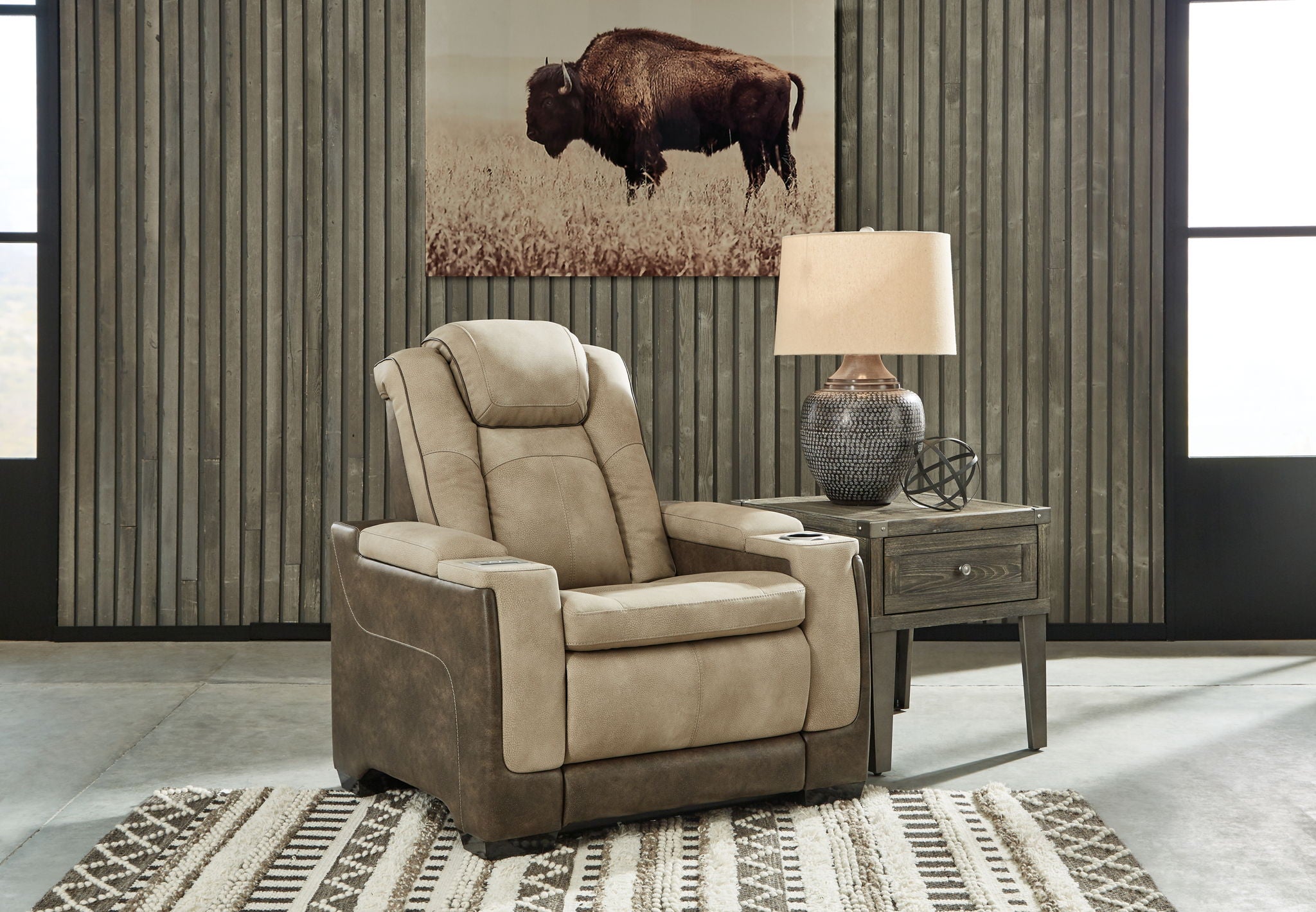 Sand recliner with adjustable headrest and padded arms, suede-look upholstery