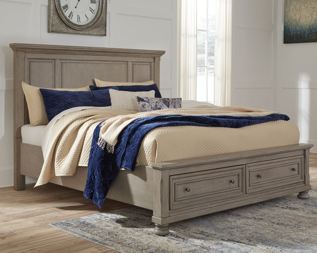 Gray panel storage bed with low storage drawers and padded headboard