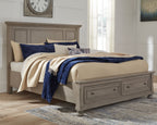 Gray panel storage bed with low storage drawers and padded headboard