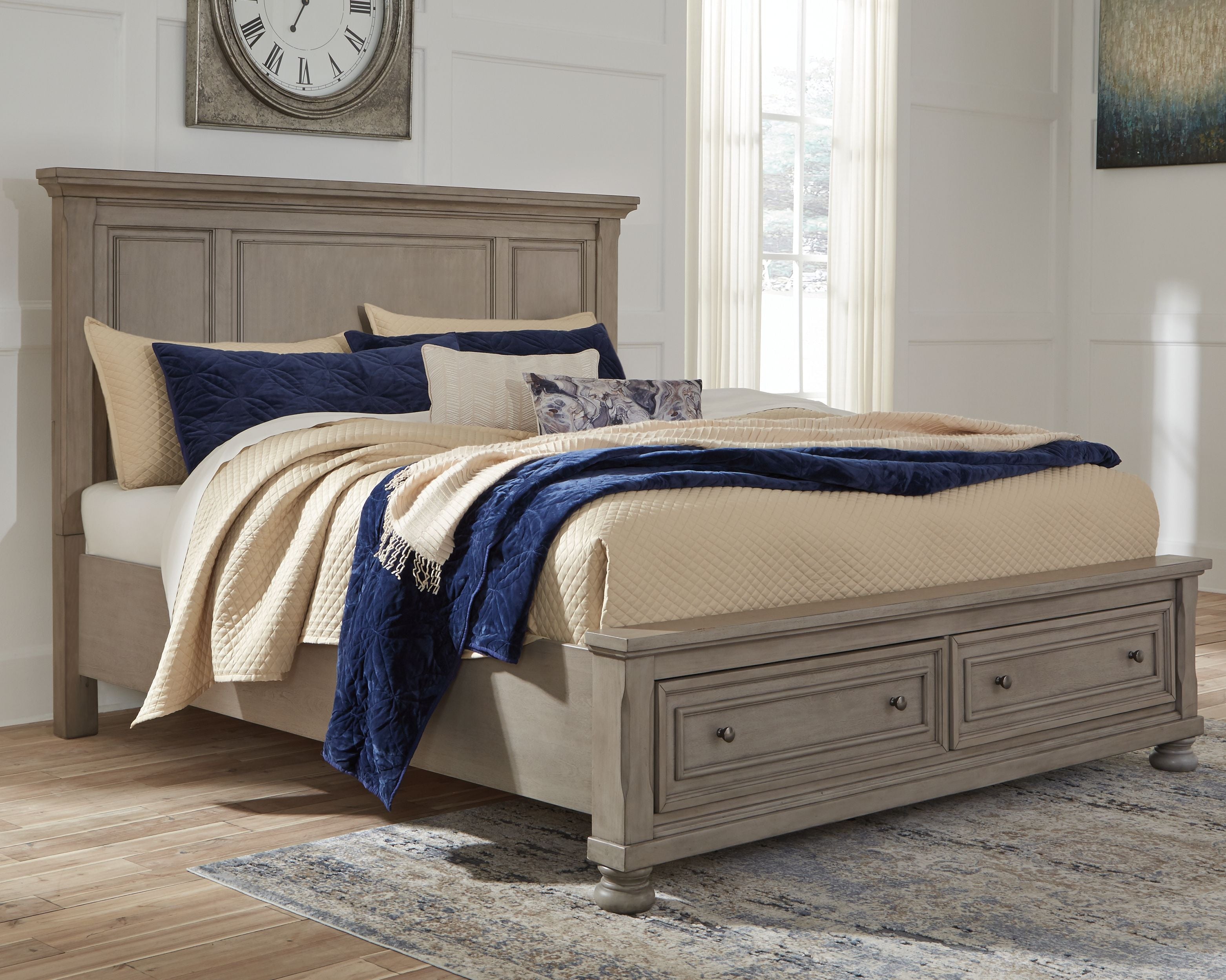 Gray panel storage bed with low storage drawers and padded headboard