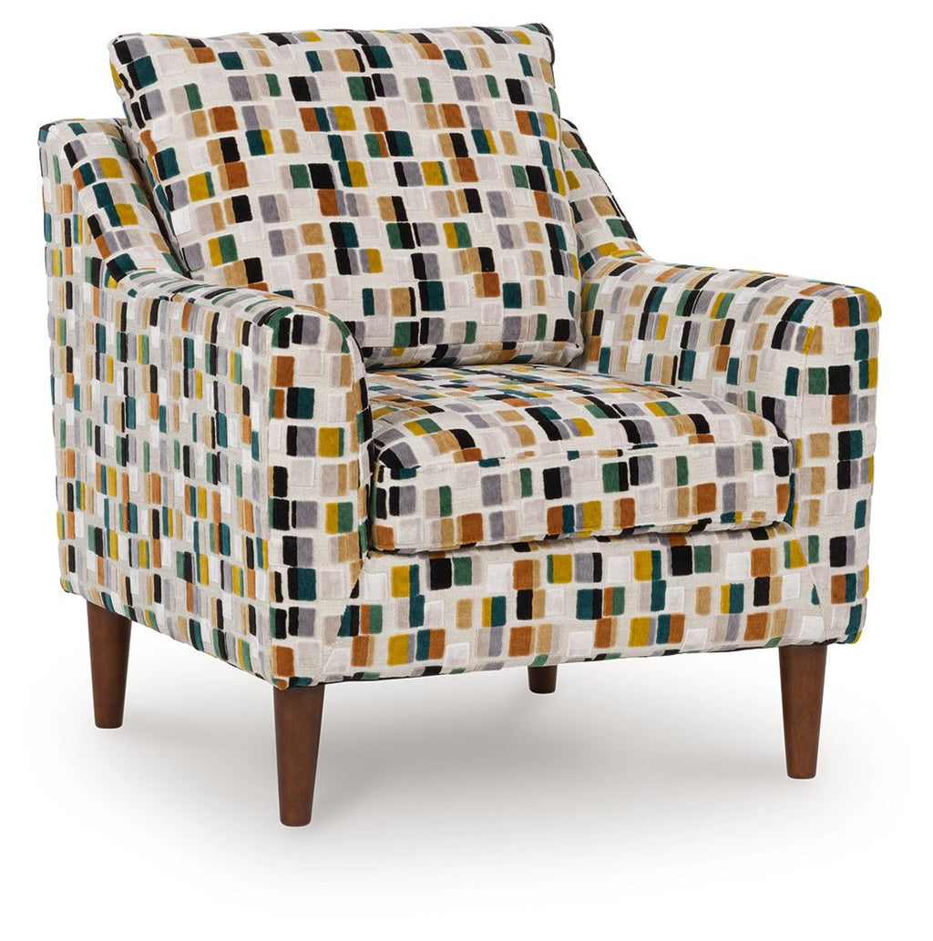 Multicolor patterned accent chair with square fabric, padded arms, dark wood legs.