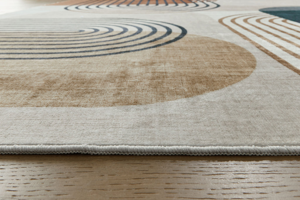 Farrendale washable rug border, beige ground with teal and tan curved stripe pattern