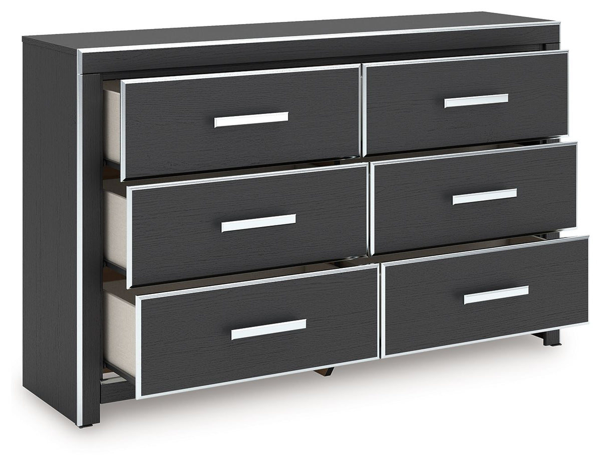 Black bedroom dresser with six drawers and silver bar pulls, open view of drawer fronts