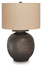 Antique brown metal table lamp with beige fabric drum shade