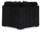 Black ribbed wedge sofa section with rounded back and thick armrests