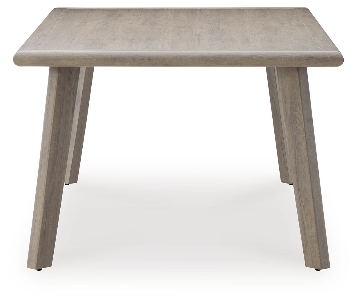 Beige rectangular dining table with square corners and four tapered legs