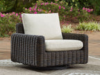 Dark brown wicker swivel glider lounge chair with beige seat and tall back cushion