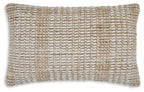Beige woven decorative pillow with textured grid pattern and short fringe edges