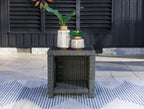 Gray wicker square end table with flat top and open lower shelf