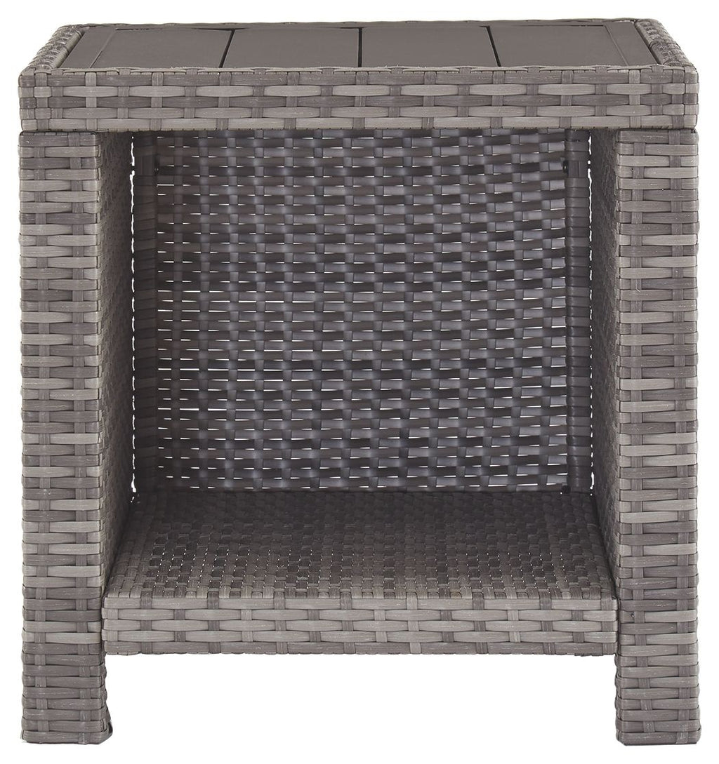 Gray square end table with woven rattan front panel and dark tabletop, open interior