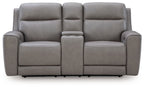 Gray power reclining loveseat with console and adjustable headrest, straight-on view