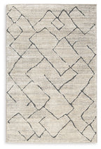 Light gray rug with dark navy geometric lattice pattern