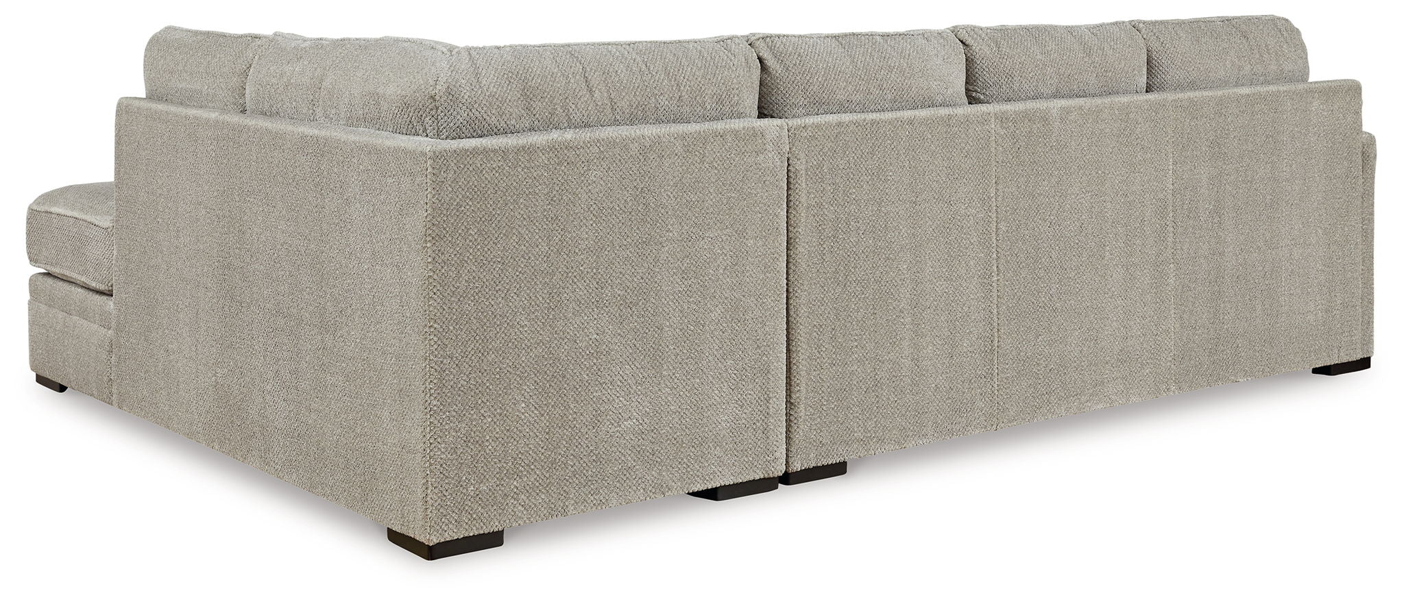 Beige fabric sectional sofa with back cushions and rounded seat edges