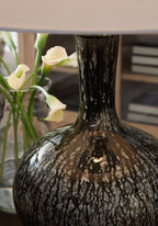 Textured antique black glass lamp base with narrow neck and round body