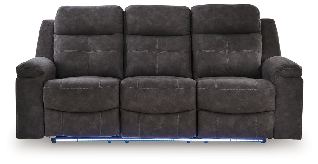 Charcoal reclining sofa with three seat pads and buttoned back cushions