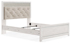 Upholstered panel bed with open support platform and light gray tufted headboard