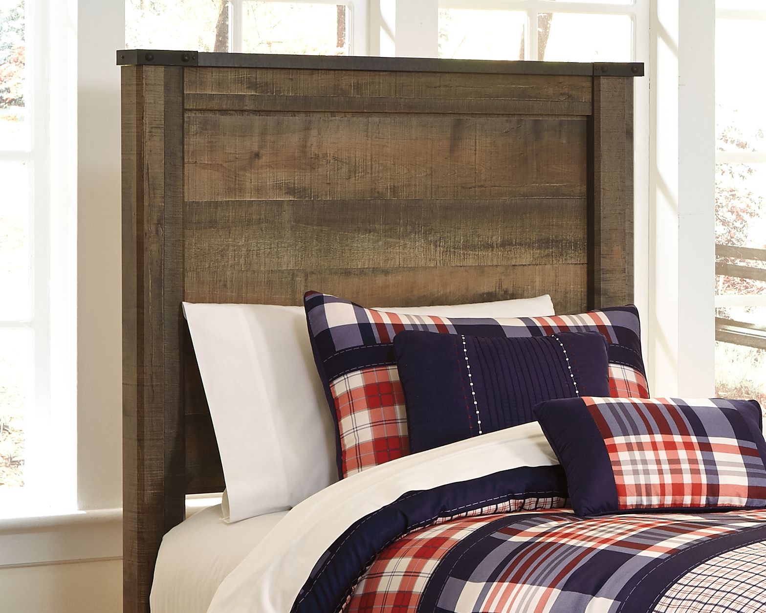 Dark brown youth panel headboard detail with horizontal plank panels