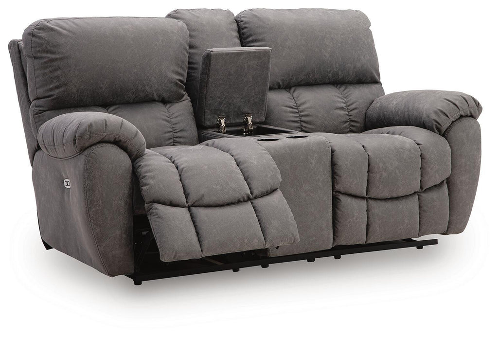 Dark gray power recline loveseat with built-in console and padded adjustable headrests