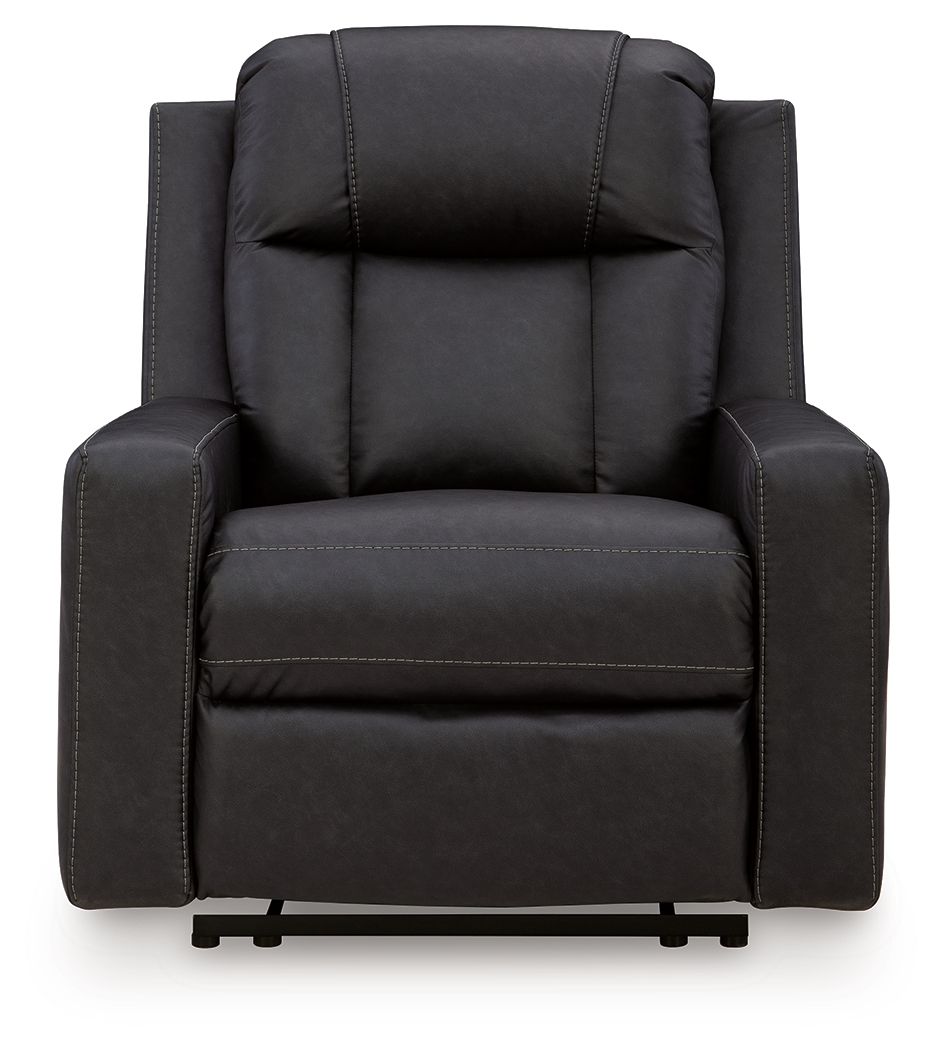 Black zero-wall recliner with tufted headrest, wide arms, and smooth front panel