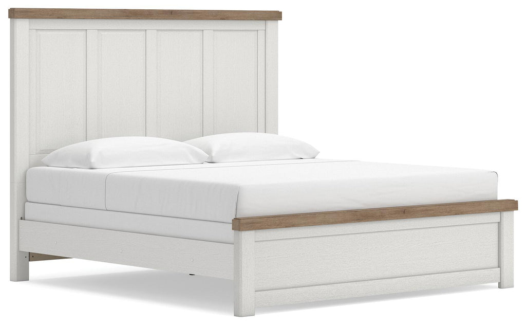 White panel bed with slatted headboard and matching footboard, wood trim.